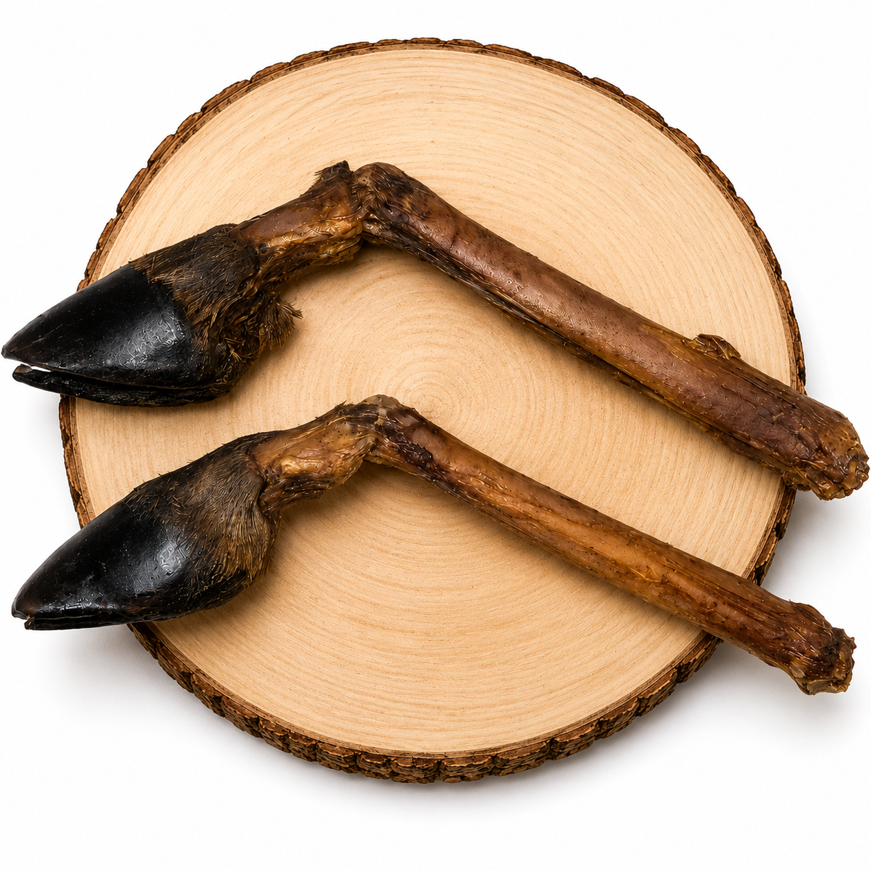 Dehydrated deer leg dog chew with natural hoof on wooden log, long-lasting natural dog treat, high-protein venison chew for dogs, durable dental chew, grain-free single ingredient dog treat