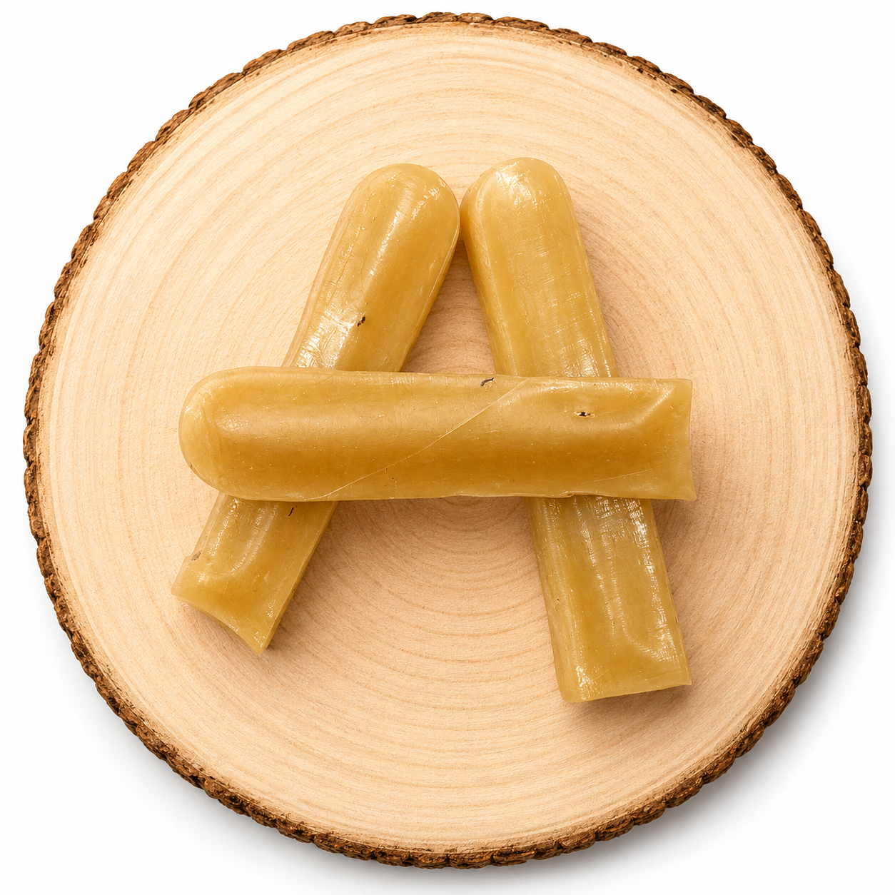 Sleepy Yak chew for dog on a wooden log