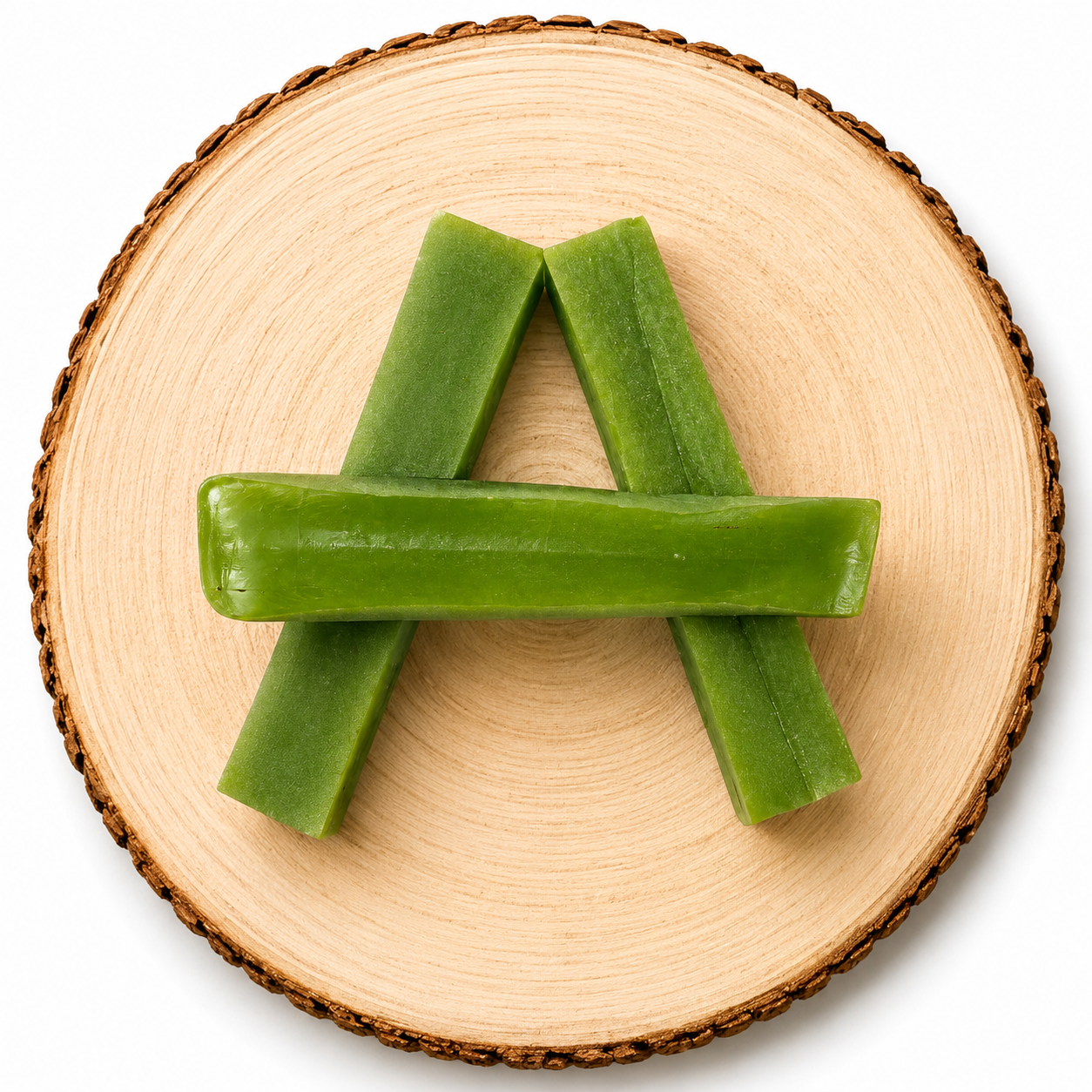 Mint yak dog chew on wooden log.