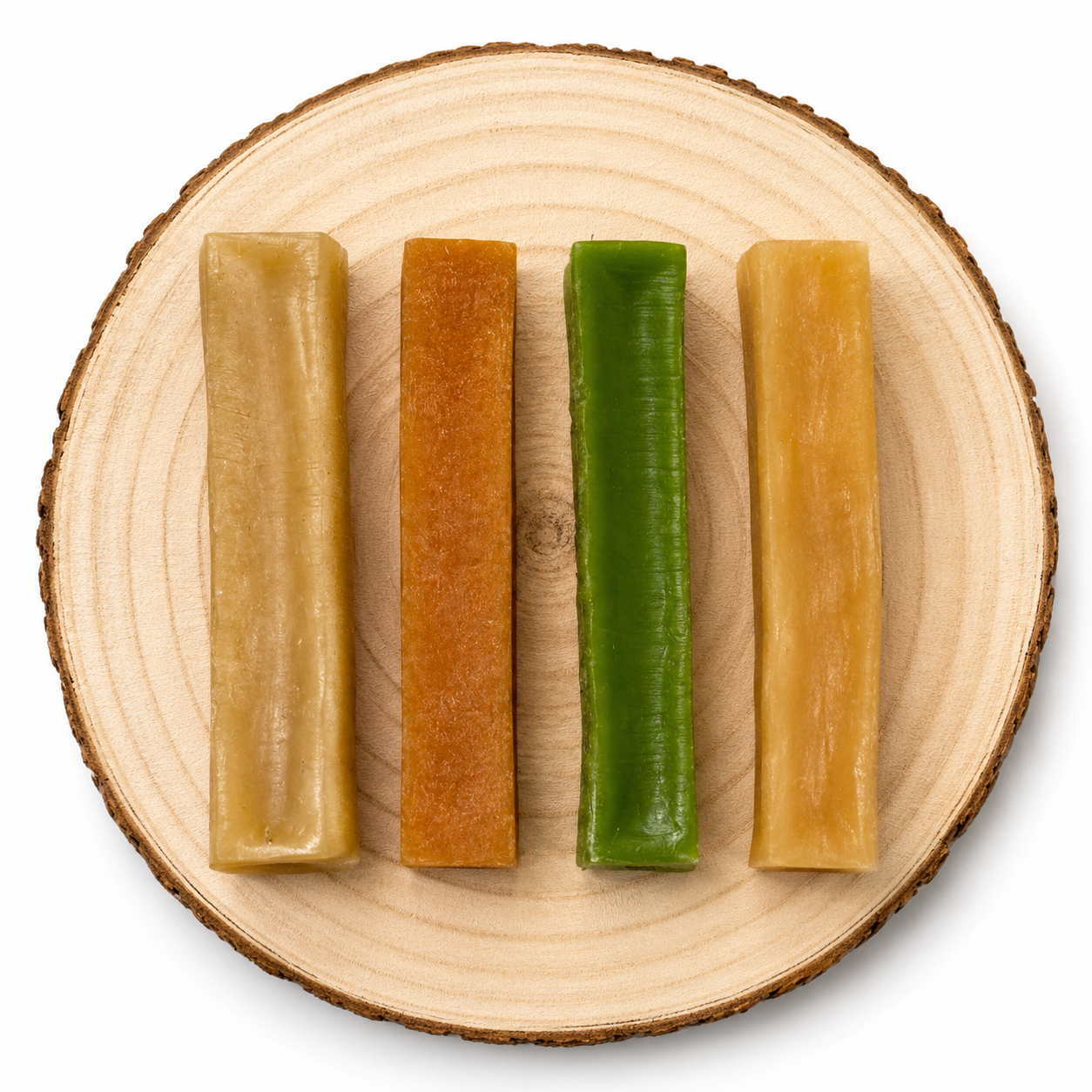 Yak Chew medium in flavours sleepy, peanut butter, mint and original displayed on a log
