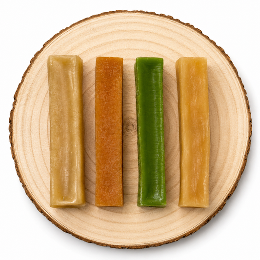 Yak Chew medium in flavours sleepy, peanut butter, mint and original displayed on a log