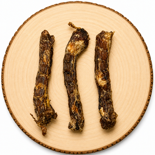 Natural duck neck dog treats on wooden log, air-dried chewy dog chew, high-protein grain-free pet treat for dental health