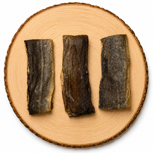 Natural fish flats for dogs and cats on rustic wooden log, air-dried fish skin pet treats rich in omega-3, grain-free high-protein chew for healthy skin, coat, and dental support for dogs and cats.